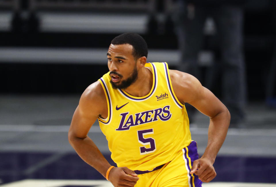 Dec 18, 2020; Phoenix, Arizona, USA; Los Angeles Lakers guard Talen Horton-Tucker (5) against the Phoenix Suns during a preseason game at Phoenix Suns Arena.