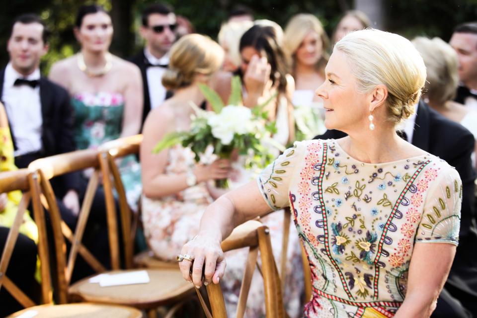 The bride wore Oscar de la Renta, inspired by her grandmother, for her greenery-filled ceremony at the Beverly Hills Hotel.