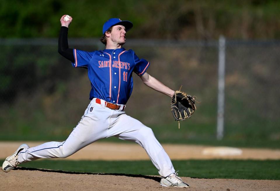 Saint Joseph’s Catholic Academy’s Nick Warner pitches during the game against Susquenita on Wednesday, April 19, 2023.