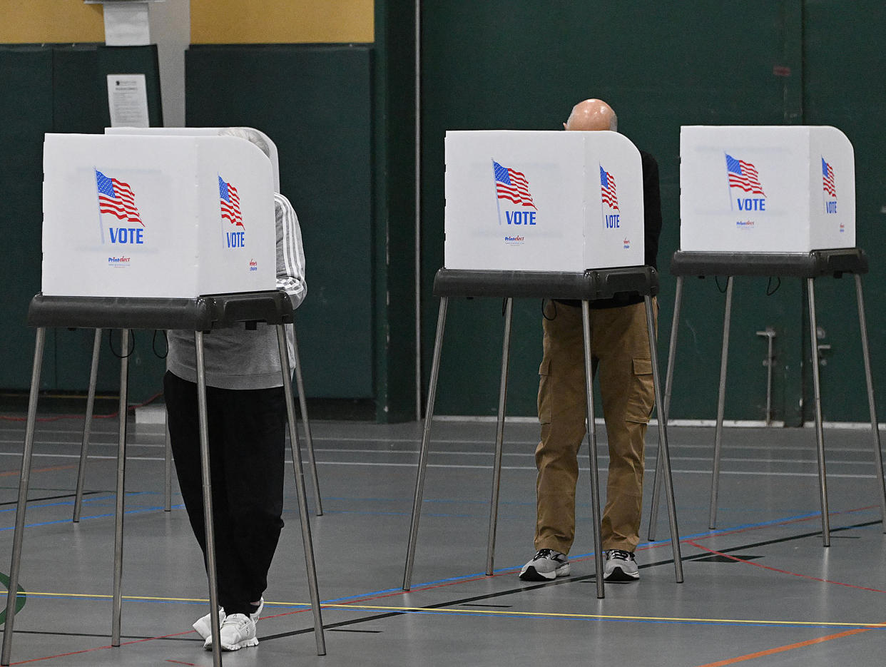 Voters vote early at Meadowbrook Athletic Complex in Elliott City, one of five early voting locations in Howard County, Maryland, as early voting begins on Oct. 27, 2022. (Jeffrey F. Bill/Baltimore Sun/Tribune News Service via Getty Images)