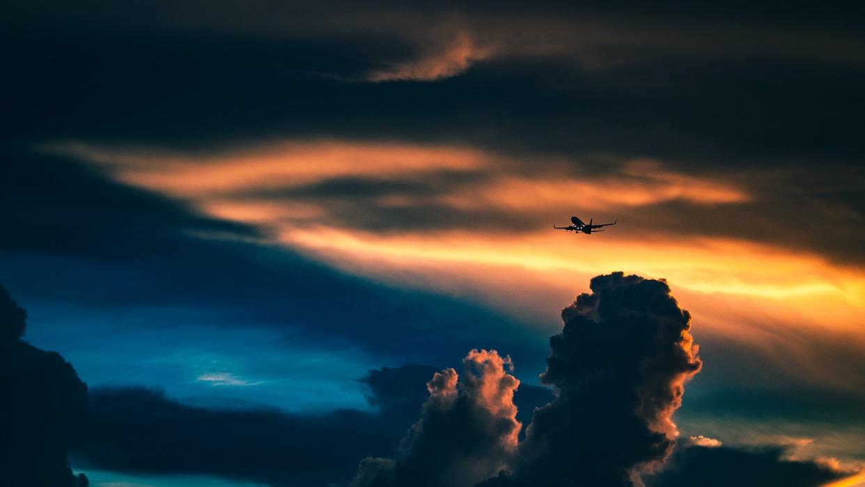 airplane flying in clouds