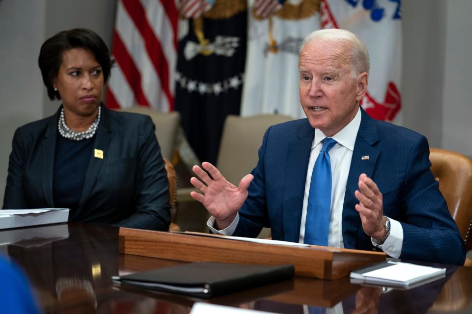 Washington Mayor Muriel Bowser listens as President Joe Biden speaks during a meeting on reducing gun violence, in the Roosevelt Room of the White House, July 12, 2021, in Washington.