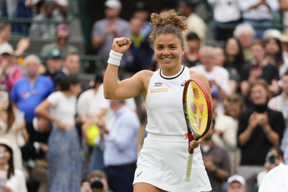 Jasmine Paolini of Italy reacts after defeating Bianca Andreescu of Canada in their third round match at the Wimbledon tennis championships in London, Friday, July 5, 2024. (AP Photo/Kirsty Wigglesworth)