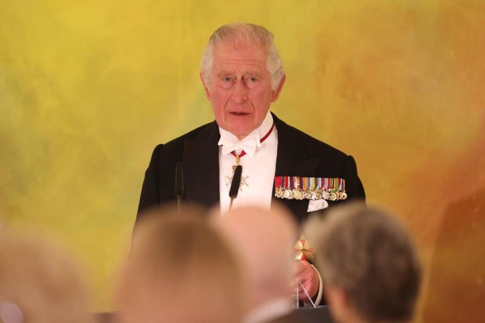 The King delivered a speech in English and German at the banquet (PA)