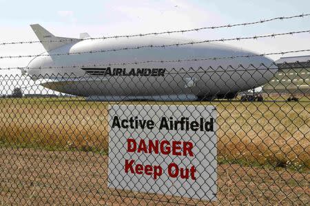 The Airlander 10 hybrid airship is seen after a crash-landing during a test flight at Cardington Airfield in Britain, August 24, 2016. REUTERS/Darren Staples