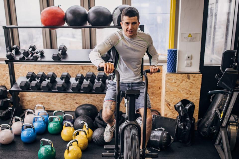 man training on exercise bike