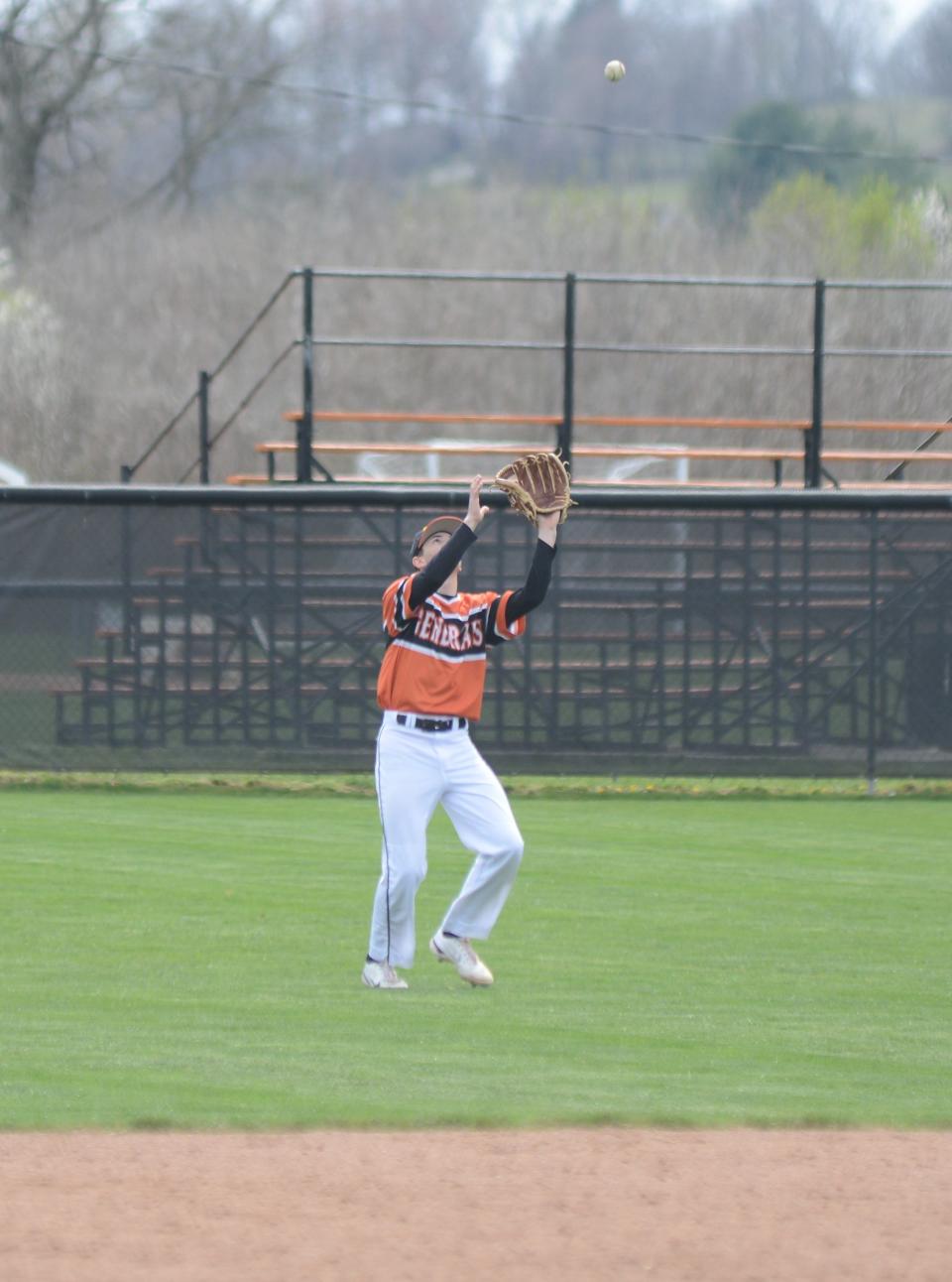 Ridgewood center field Josiah Cahill brings in a fly out during Saturday's game with River View, which won 4-2.