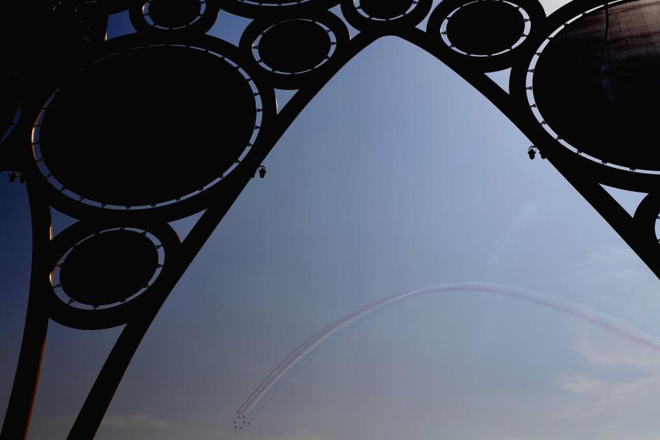 Patroille de France aerobatic team perform during a French ceremonial day at the Dubai Expo 2020 in Dubai, United Arab Emirates, Saturday, Oct, 2. 2021. (AP Photo/Kamran Jebreili)