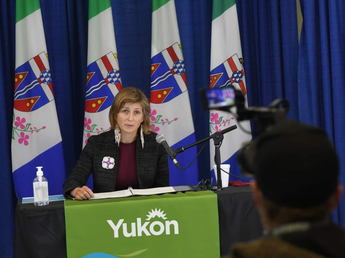 The Yukon's acting chief medical officer of health, Dr. Catherine Elliott, issued a 'strong recommendation' to wear masks in all indoor public spaces, citing concern about the daily growing number of COVID-19 cases in the territory. (Jackie Hong/CBC - image credit)