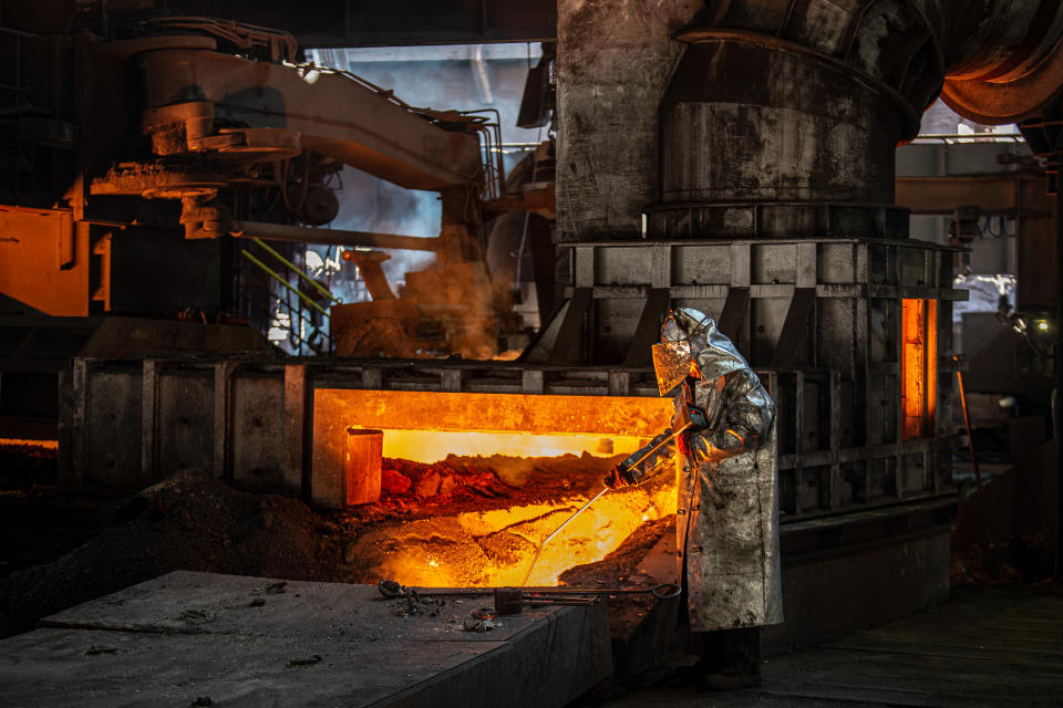 OSTRAVA, CZECH REPUBLIC - SEPTEMBER 8: A worker operates in the blast furnace at Liberty steel as Blast Furnace No. 2. which has been temporarily shut down due to a drop in demand following the coronavirus (Covid-19) pandemic, resumes working in Ostrava, Czech Republic on September 8, 2020. Liberty Ostrava a.s., part of the Liberty Steel group, is a global steel and mining company. Liberty Ostrava has an annual production capacity of 2 million tonnes of steel. Besides the Czech market, the company sells its products to more than 40 countries around the world. (Photo by Lukas Kabon/Anadolu Agency via Getty Images)