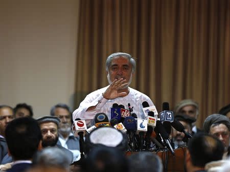 Afghan presidential candidate Abdullah Abdullah speaks during a news conference in Kabul, July 6, 2014. REUTERS/Omar Sobhani