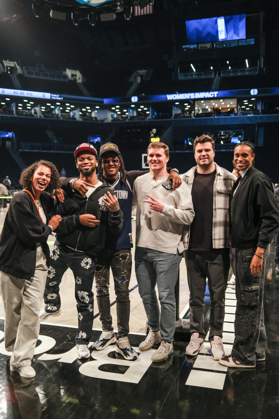 Fanatics' athletes immersion group at the Nets game.