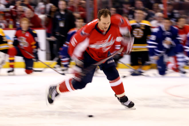 OTTAWA, ON - JANUARY 28: Dennis Wideman #6 of the Washington Capitals and Team Chara takes a shot during the Blackberry NHL Hardest Shot part of the 2012 Molson Canadian NHL All-Star Skills Competition at Scotiabank Place on January 28, 2012 in Ottawa, Ontario, Canada. (Photo by Christian Petersen/Getty Images)