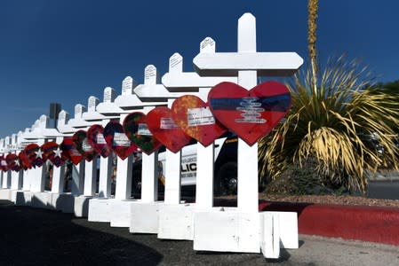 People pay their respects two days after a mass shooting in El Paso