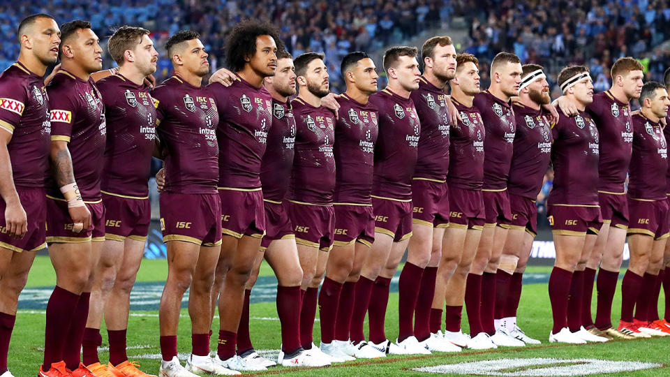 Queensland players, pictured here during the national anthem in 2019.