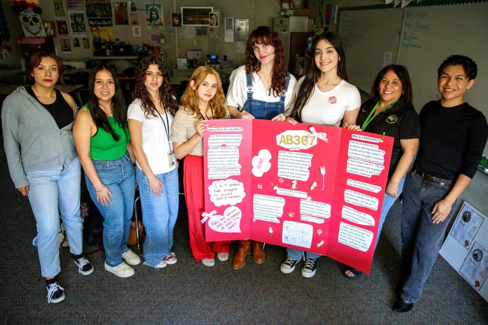 Coachella Valley High School senior Daniella Estrada, left, senior Gema Gonzalez, sophomore Miliani Rodriguez, freshman Abigail Salazar, Planned Parenthood representative Chloe Lowell, senior Julissa Felix, teacher Perla Penalber, and alum Julian Castrejon advocate for full implementation of the Menstrual Equity for All Act, in Thermal, Calif., on March 28, 2024.