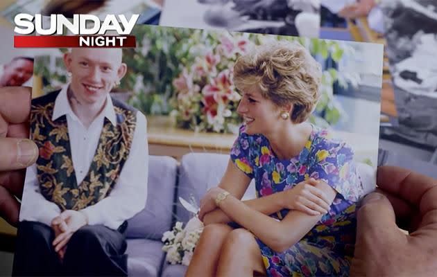 Looking at a photo of Diana visiting a patient at Britain's first Aids clinic, Elton said Harry was very like his mother. Photo: Sunday Night