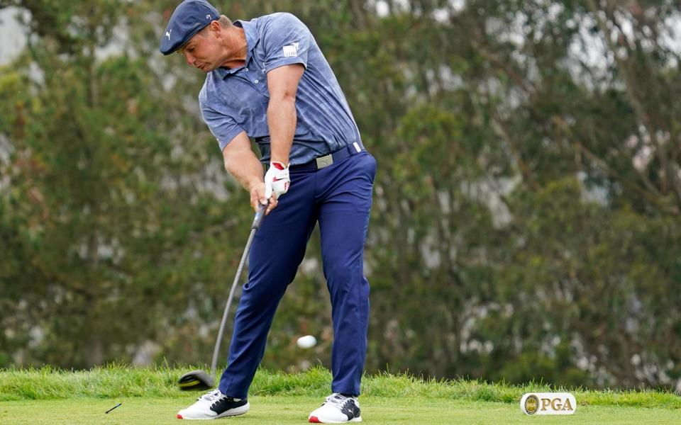 Bryson DeChambeau tees off on the 4th hole during the final round of the 2020 PGA Championship golf tournament  - USA Today