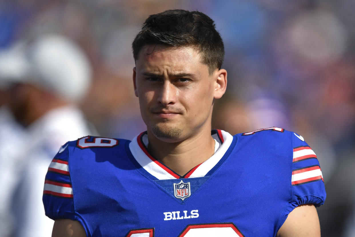 FILE - Then-Buffalo Bills punter Matt Araiza walks on the sideline during the first half of a preseason NFL football game against the Indianapolis Colts in Orchard Park, N.Y., on Aug. 13, 2022. The former Bills punter will not be charged in connection with an alleged gang rape of a 17-year-old girl at an off-campus party last year when he played football for San Diego State University, prosecutors said Wednesday, Dec. 7, 2022. (AP Photo/Adrian Kraus, File)