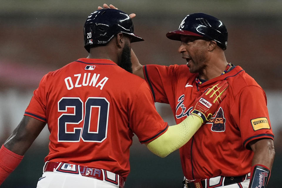 Atlanta Braves designated hitter Marcell Ozuna (20) celebrates his two-run RBI against the Cleveland Guardians during the fourth inning of a baseball game, Friday, April 26, 2024, in Atlanta. (AP Photo/Mike Stewart)