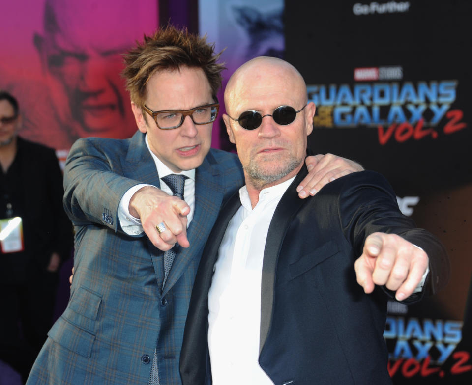 HOLLYWOOD, CA - APRIL 19:  Director James Gunn and actor Michael Rooker arrive for the Premiere Of Disney And Marvel's 