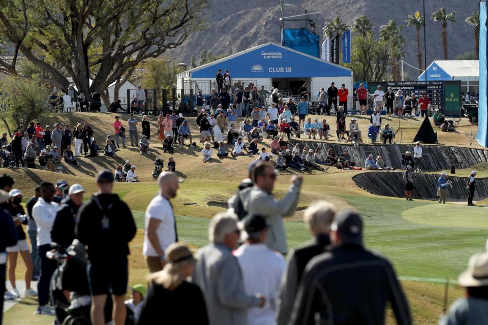 People watch Phil Mickelson on the 9th fairway of the Pete Dye Stadium Course at PGA West during round three of The American Express in La Quinta, Calif., on Saturday, Jan. 22, 2022. 