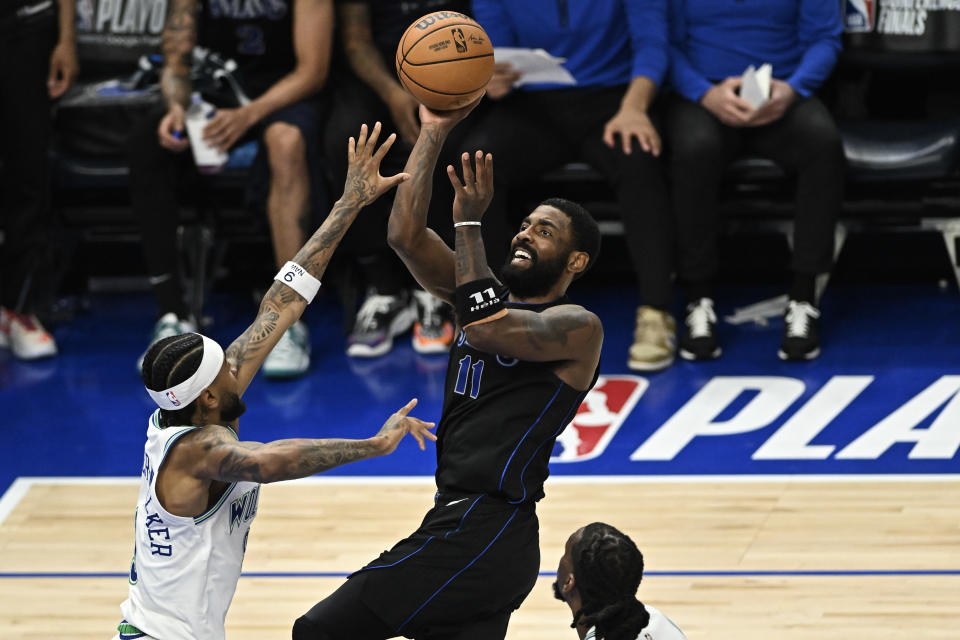 MINNEAPOLIS, MINNESOTA - MAY 24: Kyrie Irving #11 of the Dallas Mavericks shoots the ball during the first quarter against the Minnesota Timberwolves in Game Two of the Western Conference Finals at Target Center on May 24, 2024 in Minneapolis, Minnesota. NOTE TO USER: User expressly acknowledges and agrees that, by downloading and or using this photograph, User is consenting to the terms and conditions of the Getty Images License Agreement. (Photo by Stephen Maturen/Getty Images)