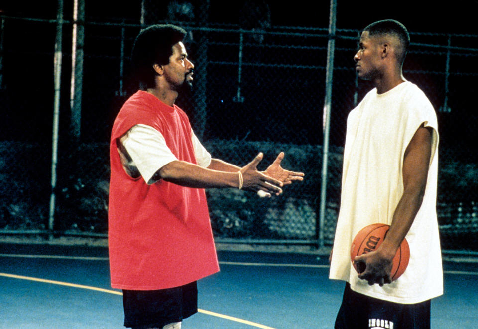 Denzel Washington talking to Ray Allen.