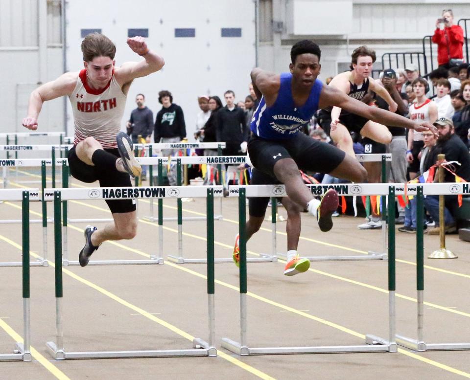 Williamsport's Richard Sanon, right, won the boys 55-meter hurdles and North Hagerstown's Ryder Johnston, left, finished second.