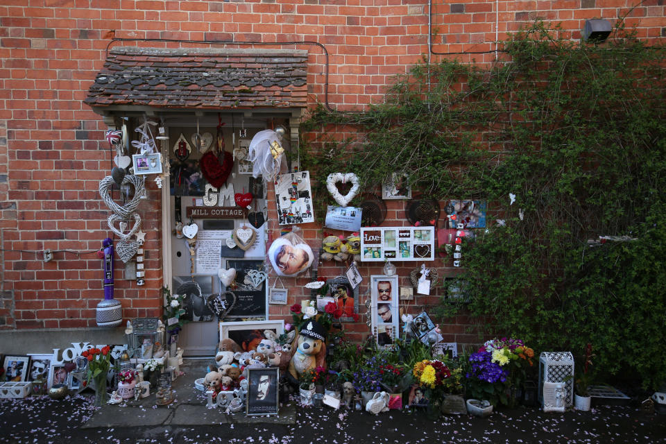 Tributes to George Michael outside his home in Goring-on-Thames, Oxfordshire. George Michael's family have asked fans to remove their tributes from outside the late singer's former homes for the sake of his neighbours.