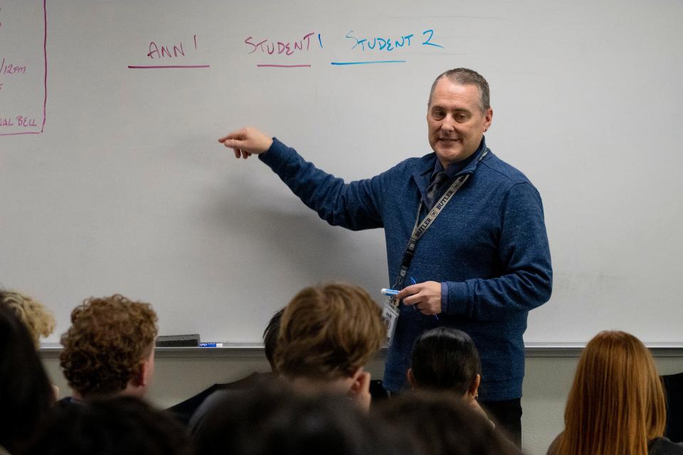 East Valley Institute of Technology radio production teacher Dave Judy instructs students during the afternoon class.