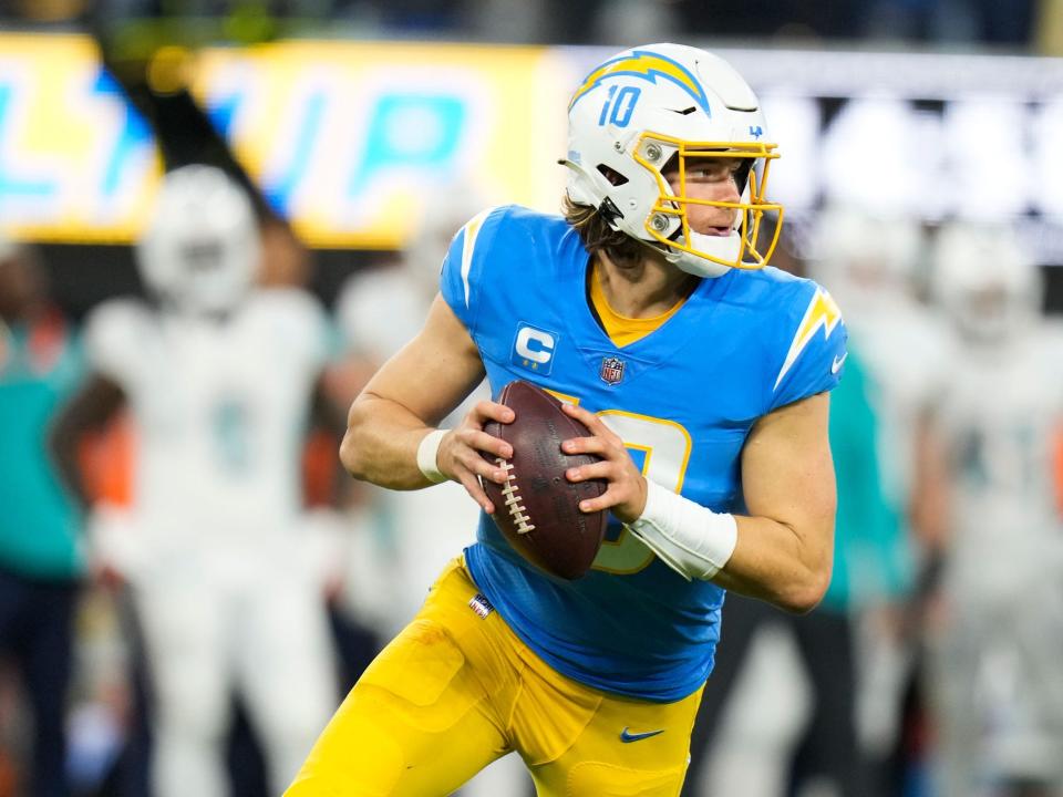 Justin Herbert looks to throw against the Miami Dolphins.