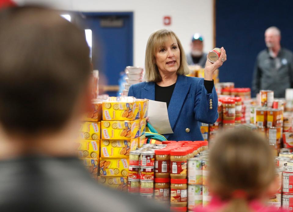 Frenship Superintendent Michelle McCord talks to her students and volunteers before starting the food packing. The Winter Tiger Bites event featured members of the Frenship staff, Willow Bend Elementary School, members of the Rotary Club of Lubbock, and Betenbough volunteers who filled more than 500 backpacks with food that will be delivered to families needing extra help this Christmas.