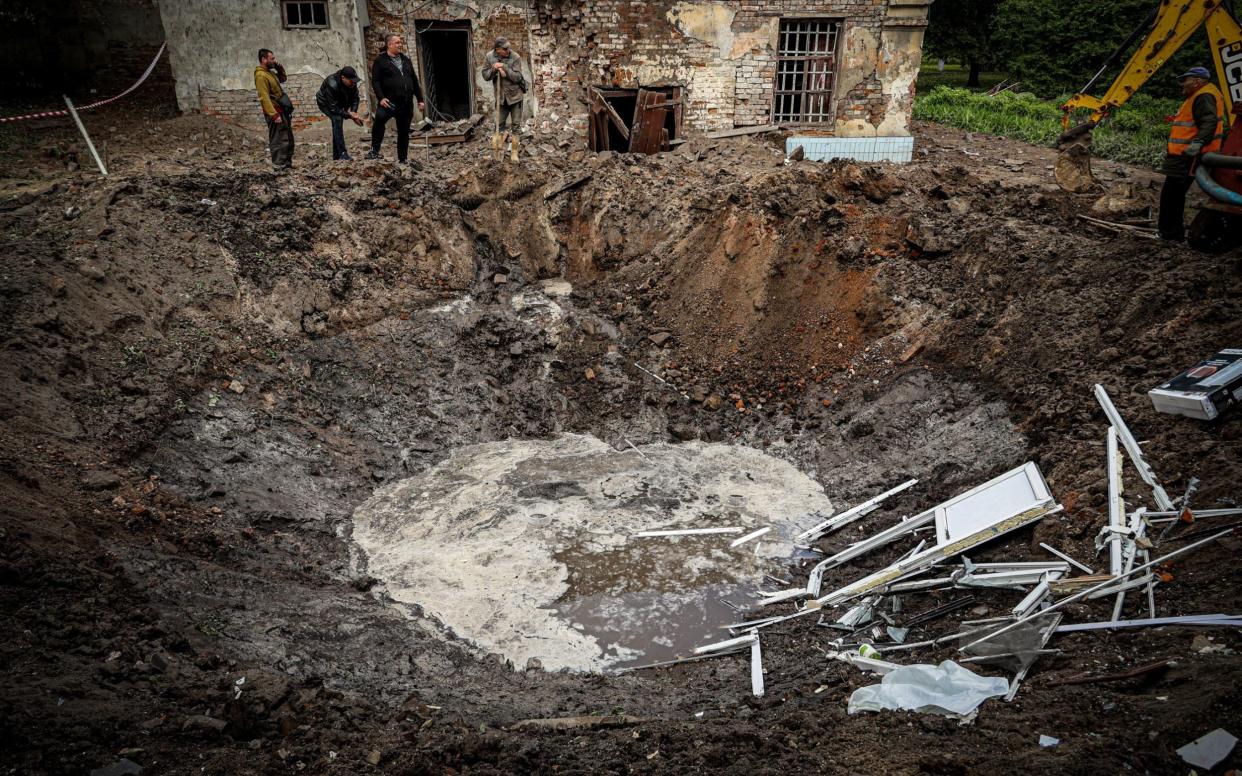 The sinkhole from a Russian missile hit. Last night, Russian troops hit the territory of the Regional Clinical Psychiatric Hospital No. 3 with two missiles in the city of Kharkiv, Ukraine on April 27, 2024.