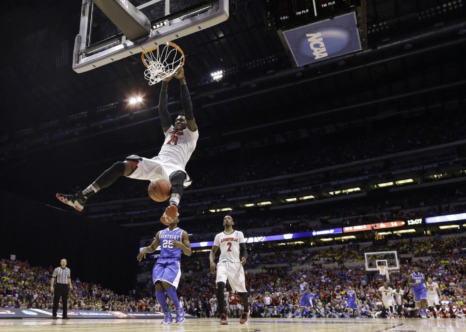 Louisville's Montrezl Harrell dunks during the first half of an NCAA Midwest Regional semifinal college basketball tournament game against the Kentucky Friday, March 28, 2014, in Indianapolis. (AP Photo/David J. Phillip)