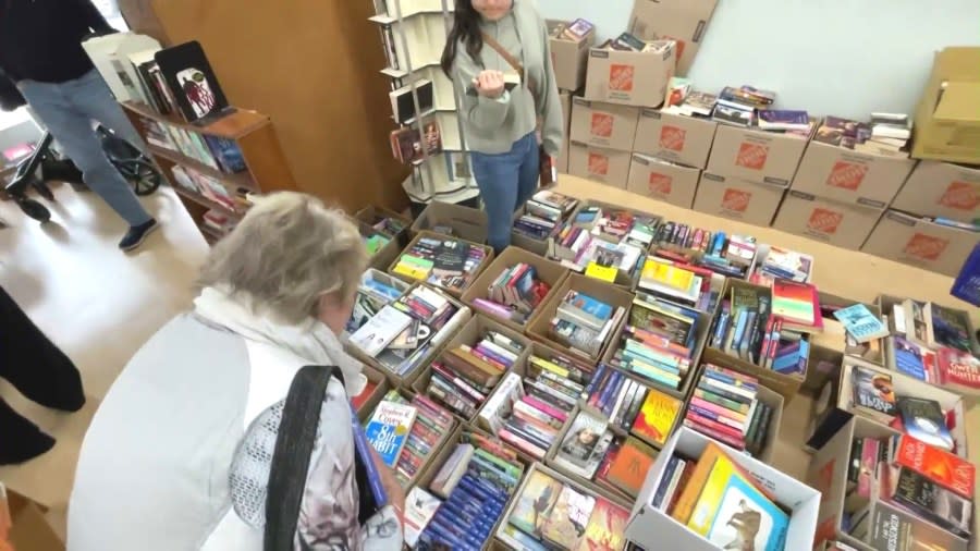 Customers shop a closeout sale at The Book Rack in Arcadia on Feb. 27, 2024. (KTLA)