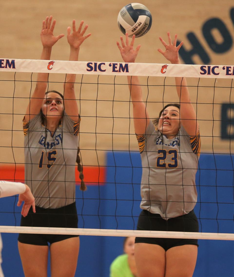 Veribest High School's Emily Bolin, left, and Meredith Robles go up for a block against Wildorado in the Region I-1A finals in San Angelo on Saturday, Nov. 13, 2021.