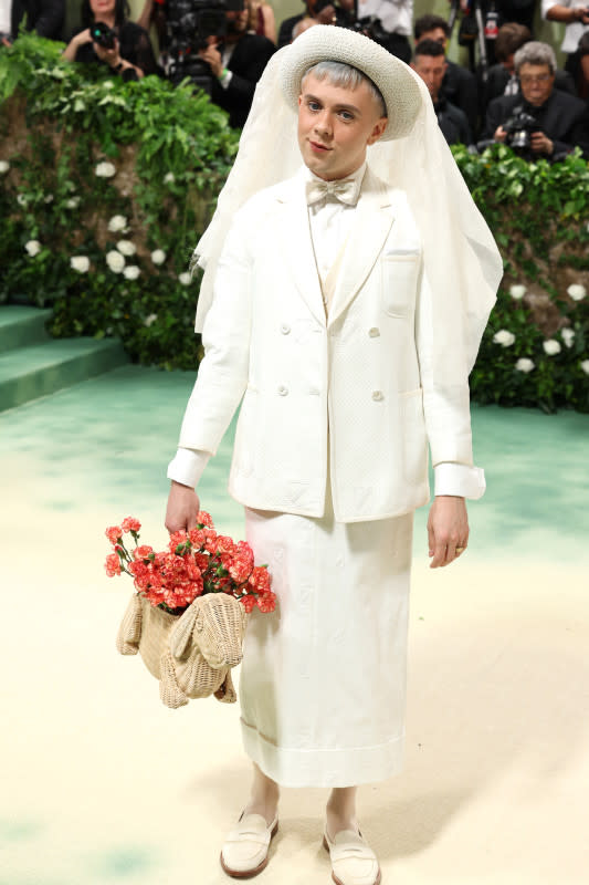 <p>Marleen Moise/Getty Images</p><p>The newly minted Broadway star and comedian wore a white skirt suit with a hat and veil. He carried another of Thom Browne's signature dog-shaped bags. </p>