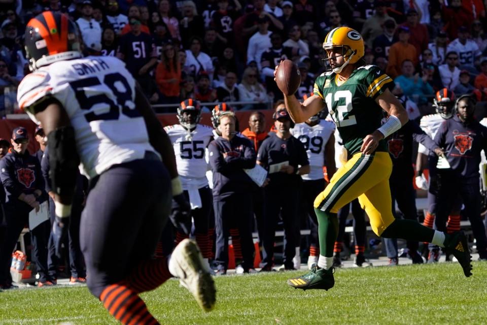 Aaron Rodgers ran in a touchdown as the Green Bay Packers beat the Chicago Bears (David Banks/AP) (AP)