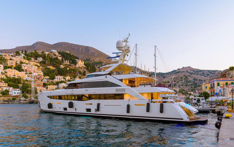 Yachts are enjoyed by the super-rich for privacy, flexibility and so they can show off, says a luxury concierge manager - AegeanPhoto / Alamy Stock Photo