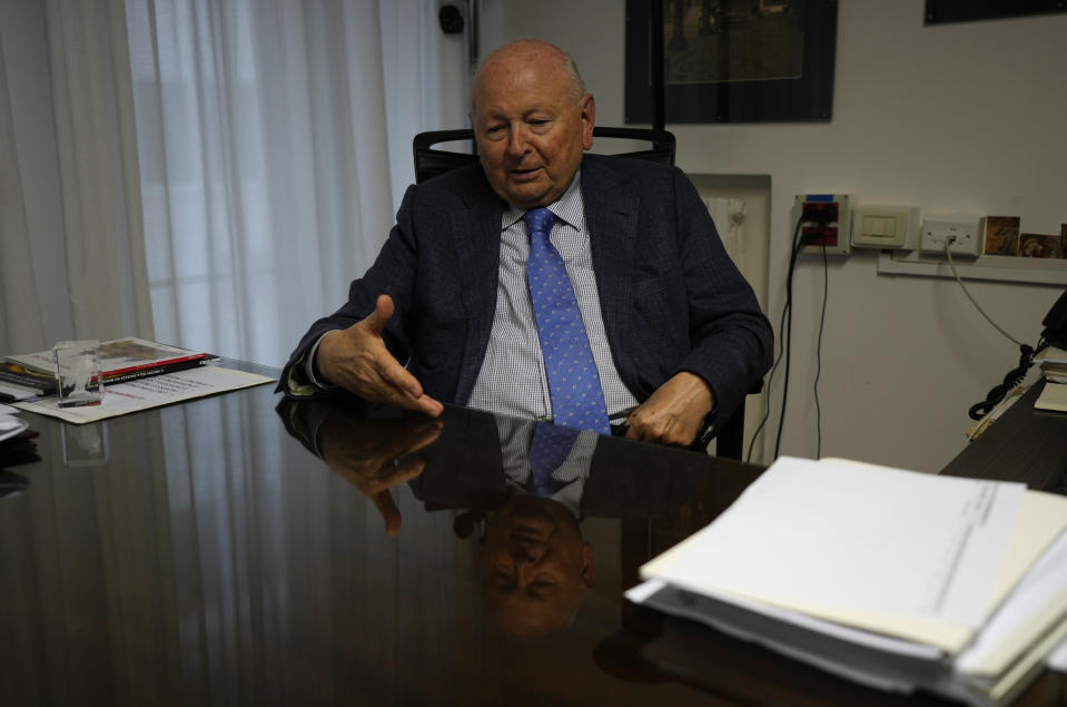 St. Mark's chief caretaker, Carlo Alberto Tesserin talks with AP journalist during an interview, in Venice, Italy, Thursday, Oct. 7, 2021. Lashing winds that pushed 1.87 meters (nearly 6 feet 2 inches) of water into Venice in November 2019 and ripped the lead tiles off St. Mark's Basilica for the first time ever shocked Venetians with the city's second-worst flood in history, but it was the additional four exceptional floods over the next six weeks that triggered fears about the impact of worsening climate change. (AP Photo/Antonio Calanni)