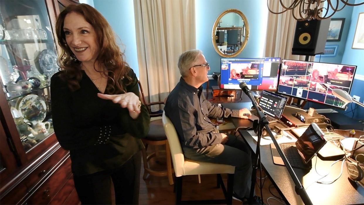 Robin Spielberg, left, with her husband/manager Larry Kosson in what was once their dining room now converted into a live studio during the pandemic as the couple transitioned to live streaming.