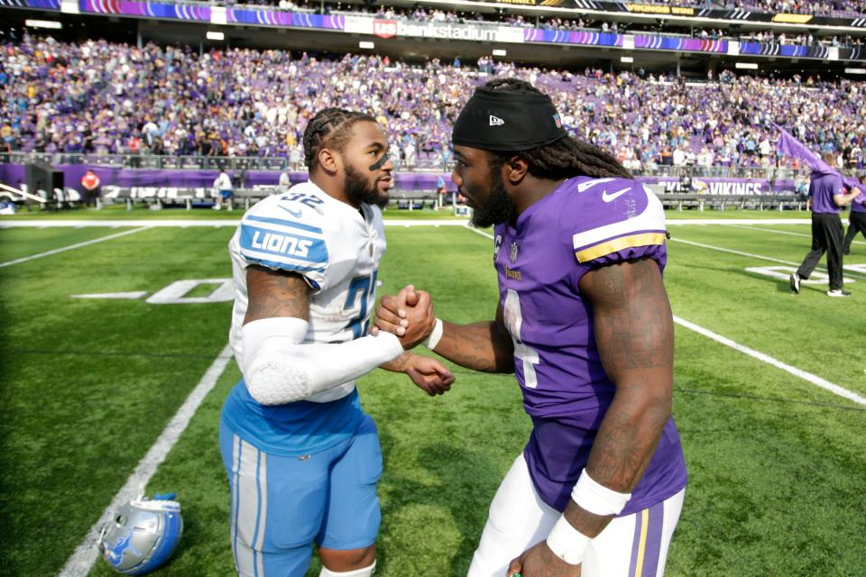 Detroit Lions running back D'Andre Swift, left, greets Minnesota Vikings running back Dalvin Cook after the Vikings won, 28-24, Sunday, Sept. 25, 2022, in Minneapolis.