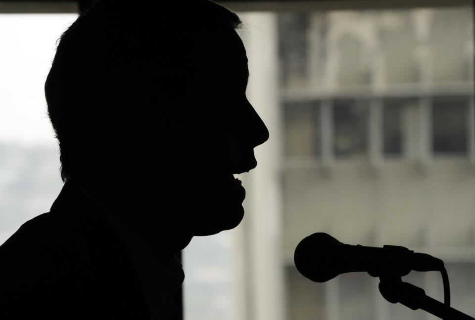 Venezuelan opposition leader Juan Guaido speaks to the press in Caracas, Venezuela, Tuesday, June 14, 2022. Guaido talked about the incident where he was physically attacked during a visit to a rural community which he said was by pro-government groups. (AP Photo/Ariana Cubillos)