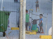 An undated supplied image from Amnesty International claiming to show children playing near a fence at the country's Australian-run detention centre on the Pacific island nation of Nauru. Amnesty International/Handout via REUTERS