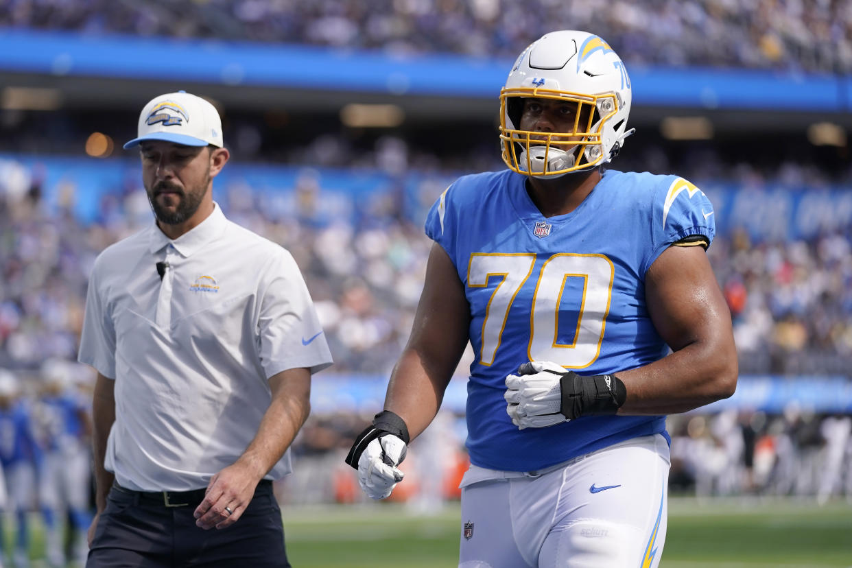 Los Angeles Chargers offensive tackle Rashawn Slater (70) walks off the field during the second half of an NFL football game against the Jacksonville Jaguars in Inglewood, Calif., Sunday, Sept. 25, 2022. (AP Photo/Mark J. Terrill)