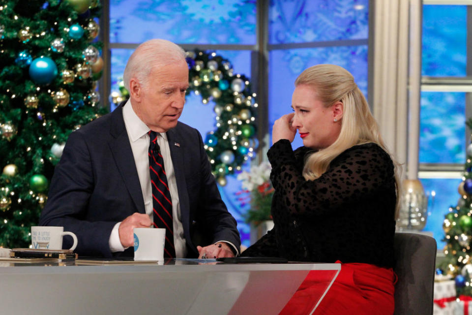 Joe Biden on an episode of The View comforts Meghan McCain - the daughter of John McCain.