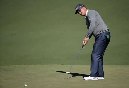 Charley Hoffman of the U.S. putts on the second green in second round play during the 2017 Masters golf tournament at Augusta National Golf Club in Augusta, Georgia, U.S., April 7, 2017. REUTERS/Lucy Nicholson -