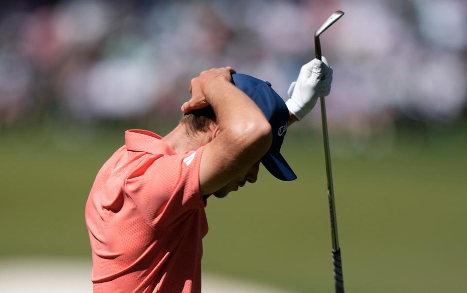 Nicolai Hojgaard holds his head in his hands