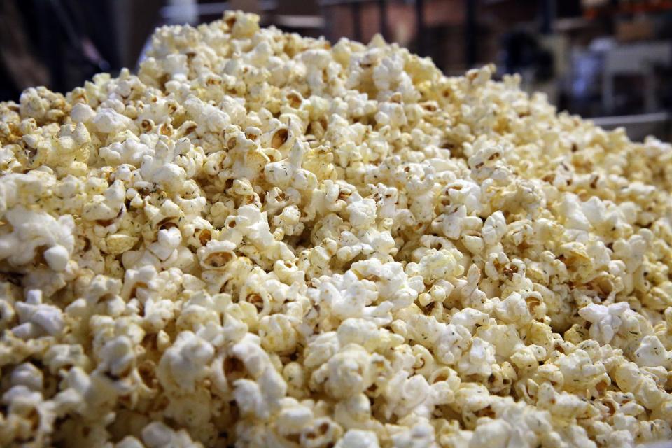 Freshly popped Popzup Popcorn is seen at the Somersworth mill where it is produced Thursday, Oct. 5, 2023.